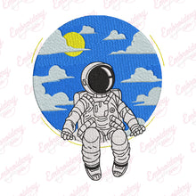 Astronaut Sitting in Space Embroidery Design