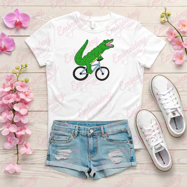 Alligator Riding Bicycle Embroidery Design
