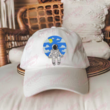 Astronaut Sitting in Space Embroidery Design